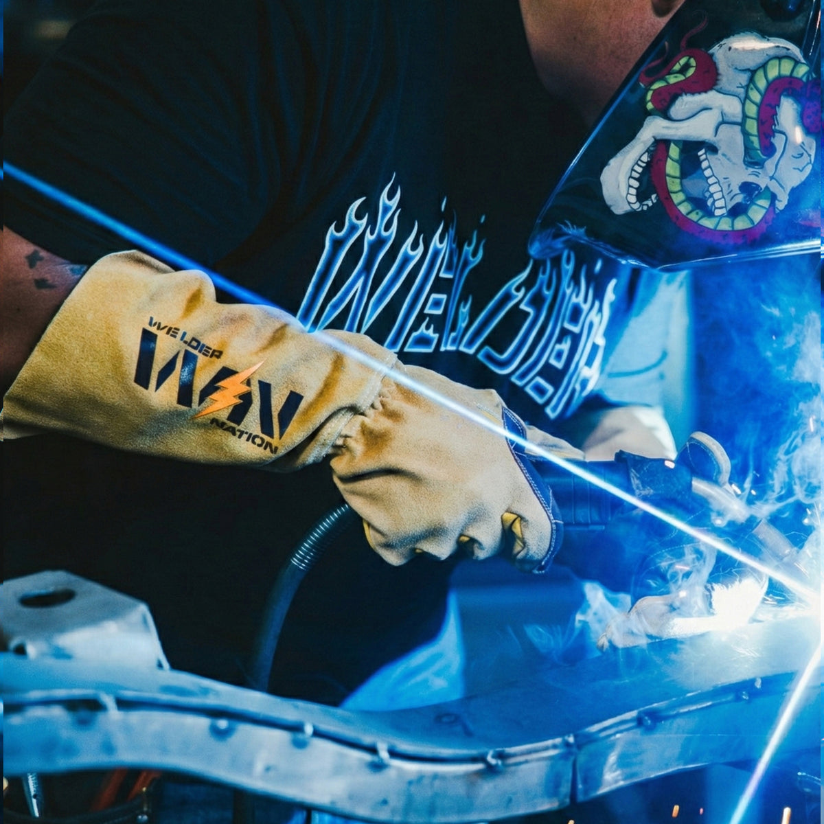Person welding a metal object wearing Welder Nation Premium Stick Welding Gloves