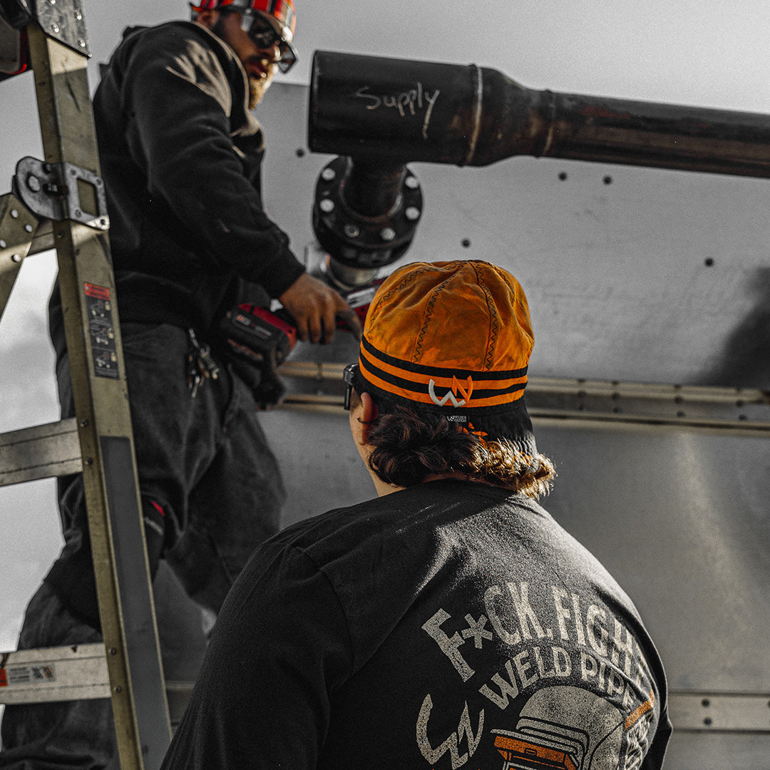 Man wearing the Captain Welding Cap in Color Orange | Welder Nation